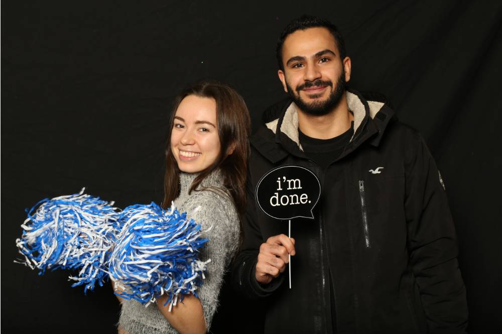 pom poms and 'im done' props for photos